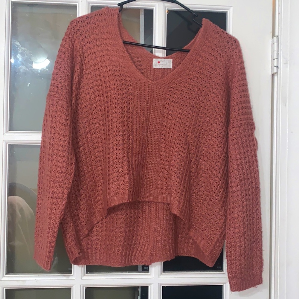 Pink v-neck knit sweater